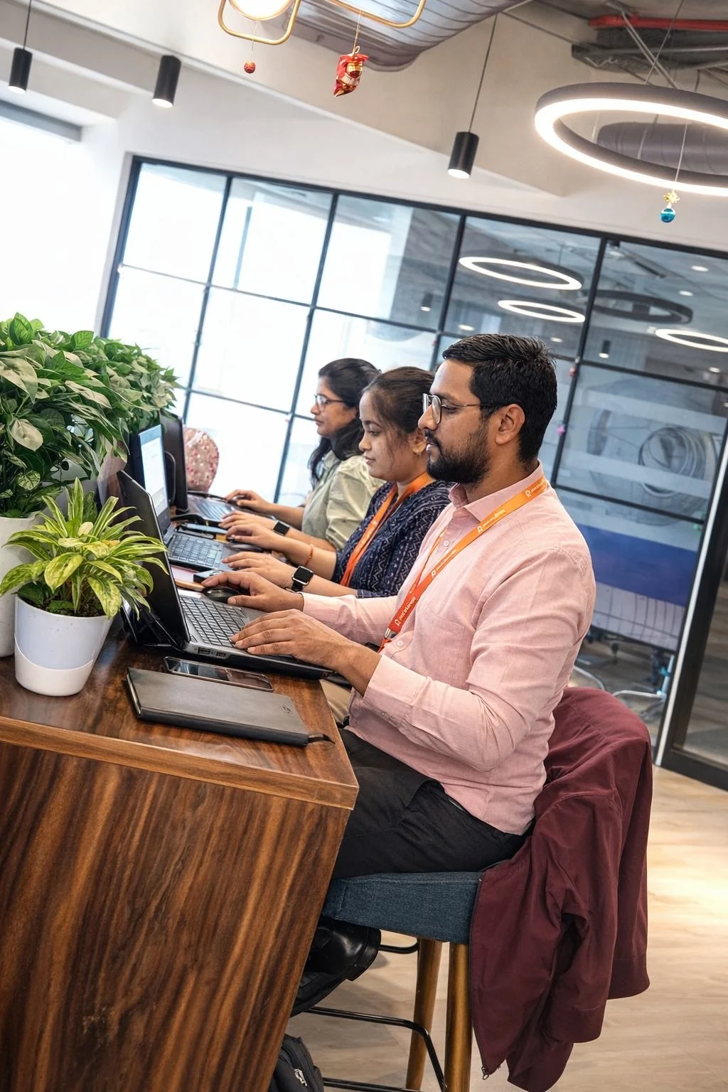 The Red Orange Technologies team at work in the office in Pune, India
